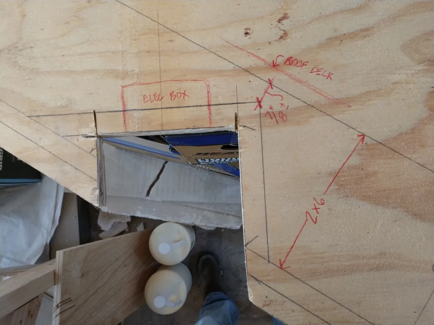 Cut plywood field mockup translating the geometry into a buildable ceiling condition