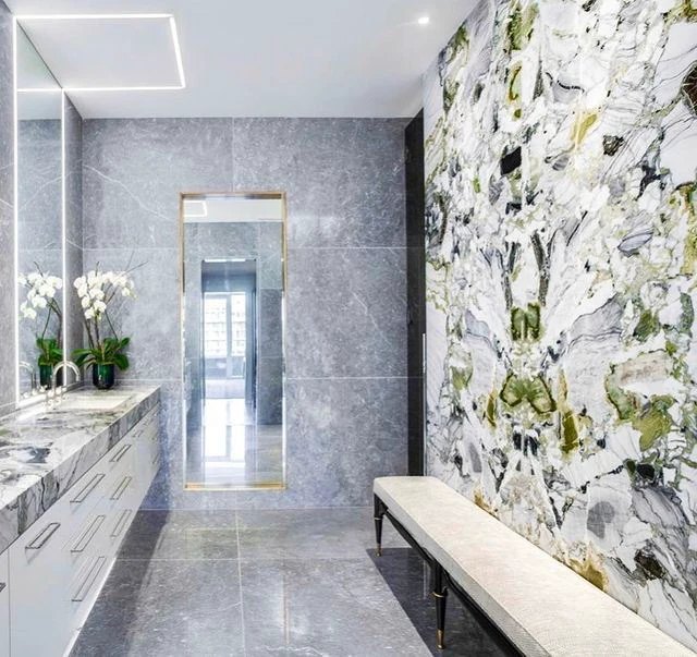 Dulock Residence continuous luminous geometry across mirror stone and ceiling